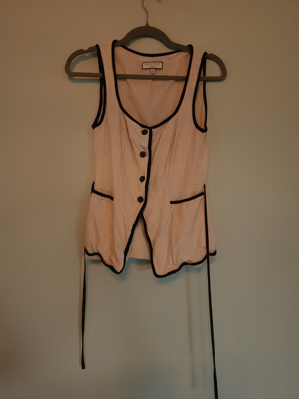Sleeveless Cream Vest with Black Trim and Tie Waist
